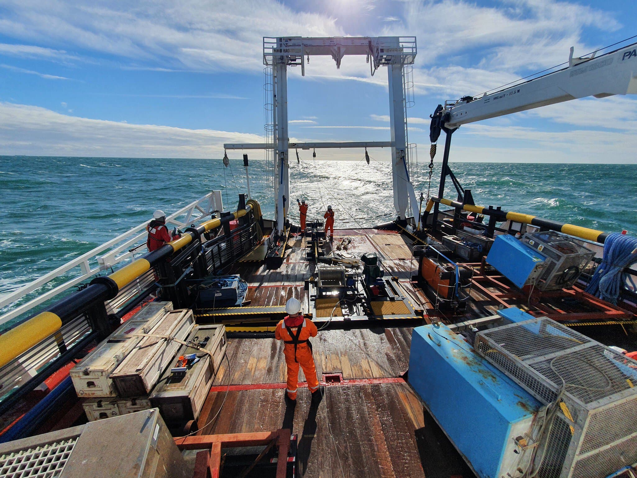 This image of some of the crew was taken during a recovery/deployment operation of the survey equipment. Seen here are the AB (far left) operating the A-frame, the banksman (front left) signalling the winch operator (centre stage), and deck hand (right of the banksman).
This image of some of the crew was taken during a recovery/deployment operation of the survey equipment. Seen here are the AB (far left) operating the A-frame, the banksman (front left) signalling the winch operator (centre stage), and deck hand (right of the banksman).
Nnorth Sea,  back deck,  survey vessel,  Helmet,  Vehicle,  Water,  Watercraft,  Waterfront
This image of some of the crew was taken during a recovery/deployment operation of the survey equipment. Seen here are the AB (far left) operating the A-frame, the banksman (front left) signalling the winch operator (centre stage), and deck hand (right of the banksman).
Nnorth Sea,  back deck,  survey vessel,  Helmet,  Vehicle,  Water,  Watercraft,  Waterfront