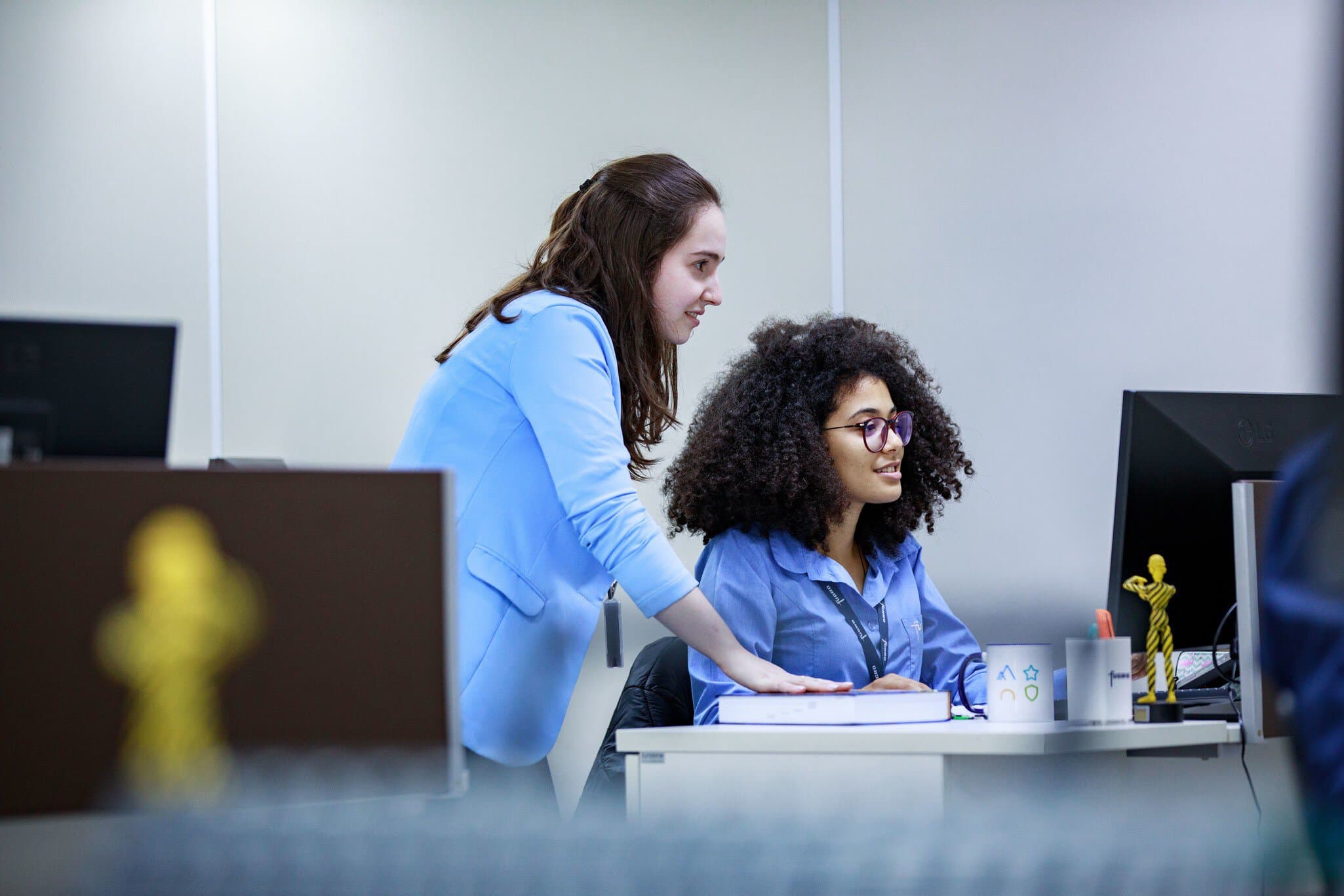 An employee working at their desk in the Curitiba office in Brazil