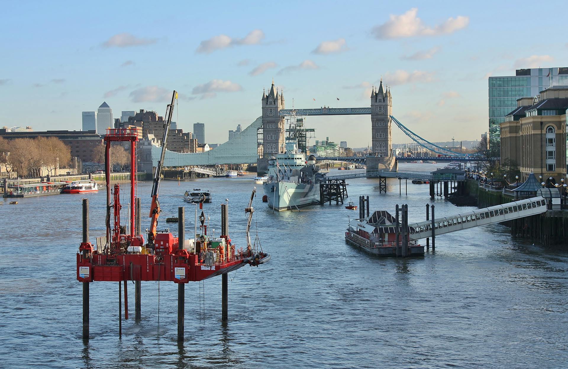 Fugro jack-up barge conducting geotechnical investigations along the River Thames in City of London near Tower Bridge. 

With the jack-up rig on the Thames, London, site investigations are being made to gather data on behalf of the Thames Tunnel Project