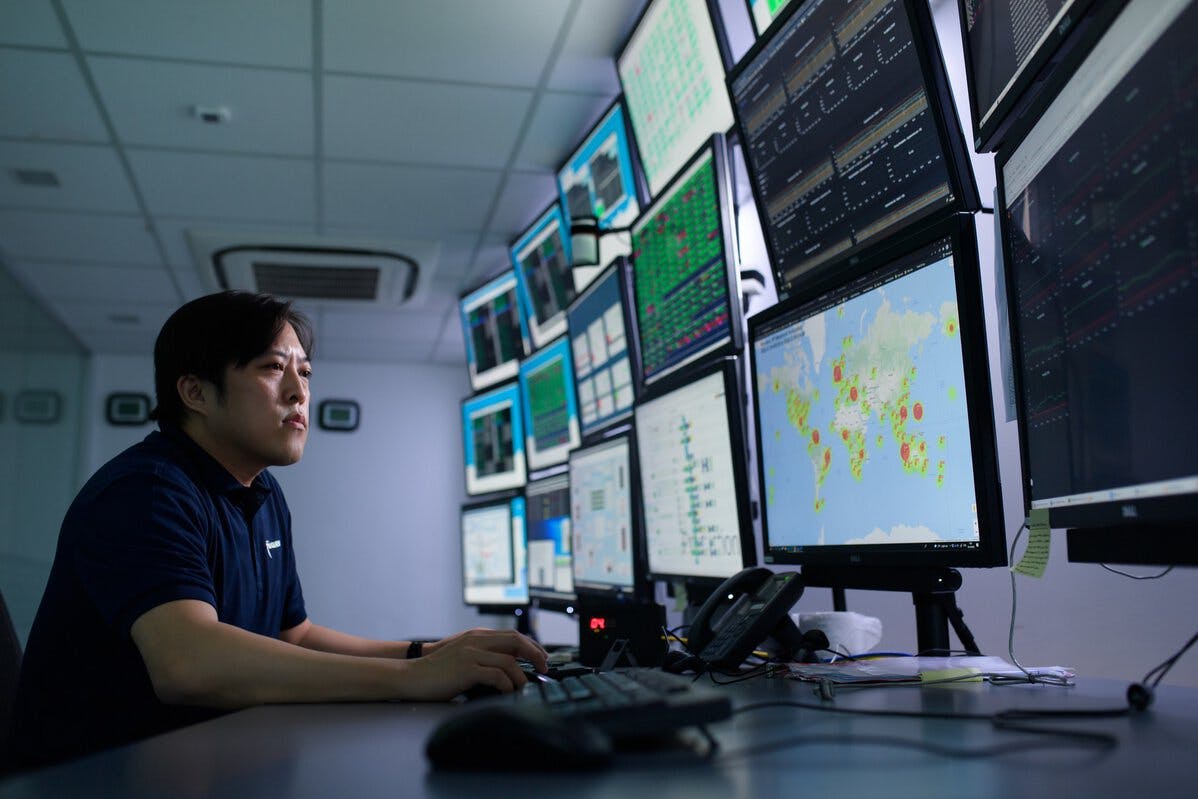 Singapore
Employee in Singapore Satellite laboratory reviewing satellite positioning data