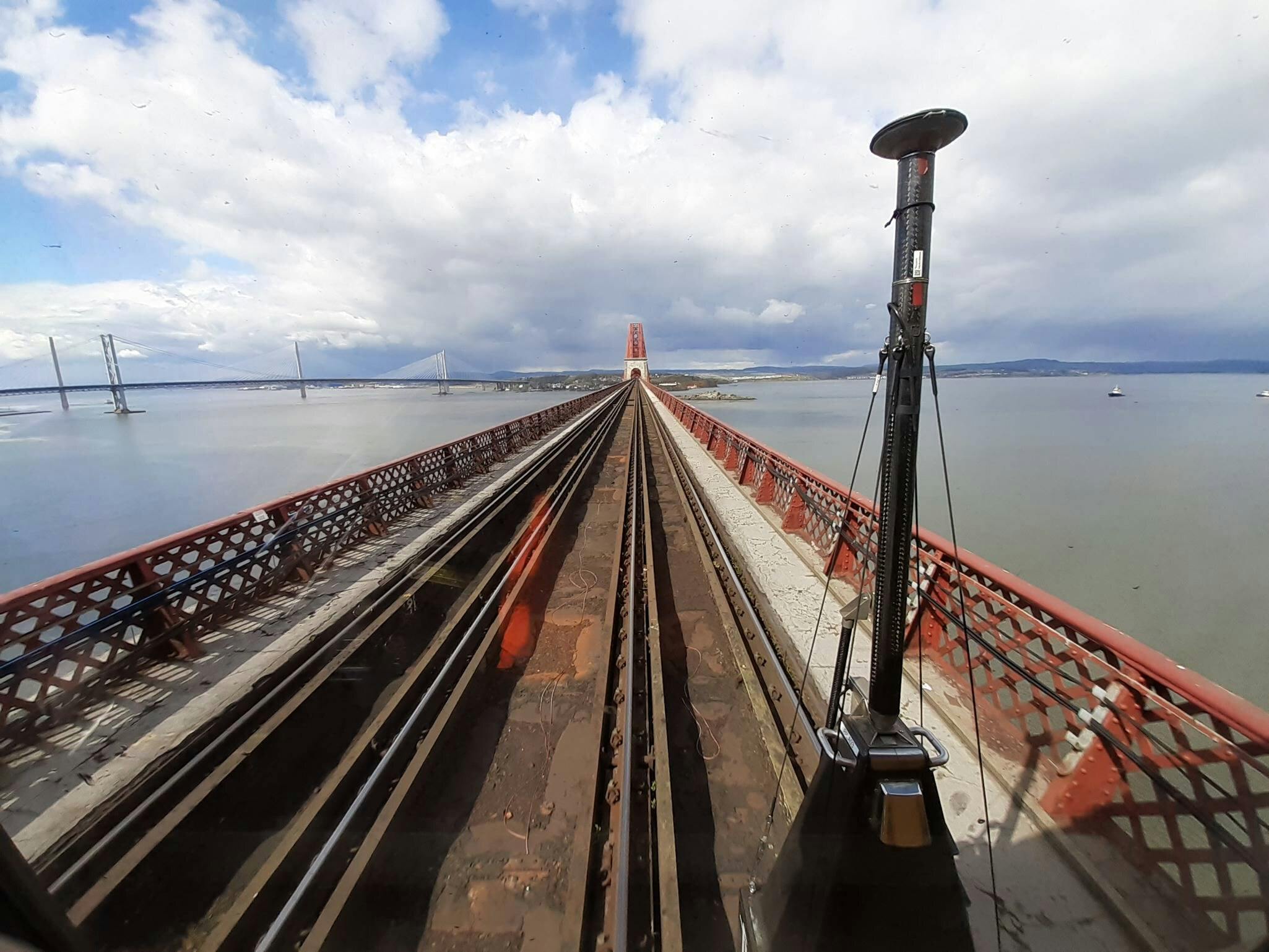 Fugro's RILA� train-mounted survey system is connected to front of the locomotive and is surveying the tracks along the Forth Bridge, Scotland