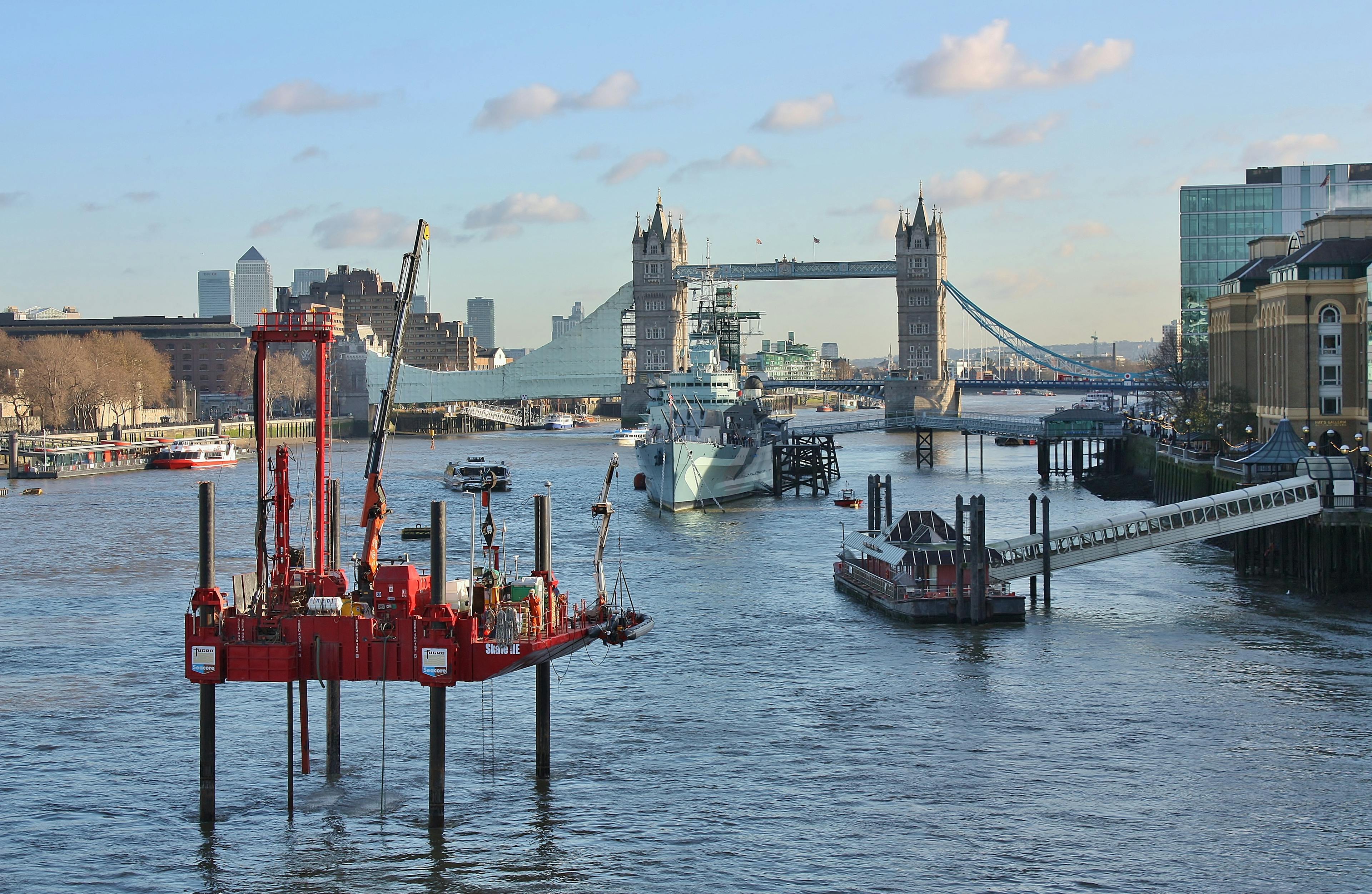 Fugro jack-up barge conducting geotechnical investigations along the River Thames in City of London near Tower Bridge. 

With the jack-up rig on the Thames, London, site investigations are being made to gather data on behalf of the Thames Tunnel Project